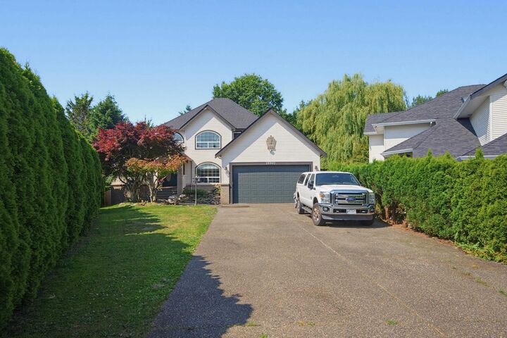 Property Photo:  26860 24A Avenue  BC V4W 3W6 