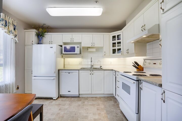 Property Photo: 20145 55A Avenue 204 BC V3A 8L6