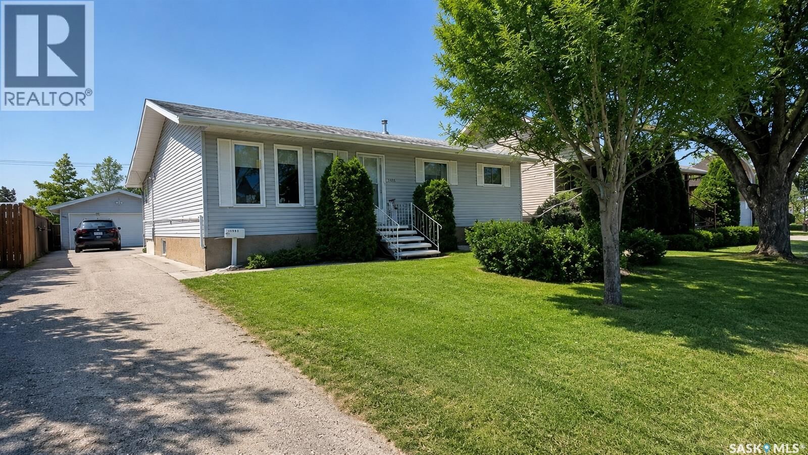 Property Photo: 10326 Henderson Drive SK S9A 3Y9