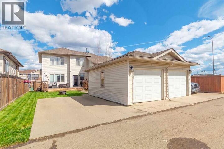 Property Photo:  253 Grosbeak Way  AB T9K 0L8 