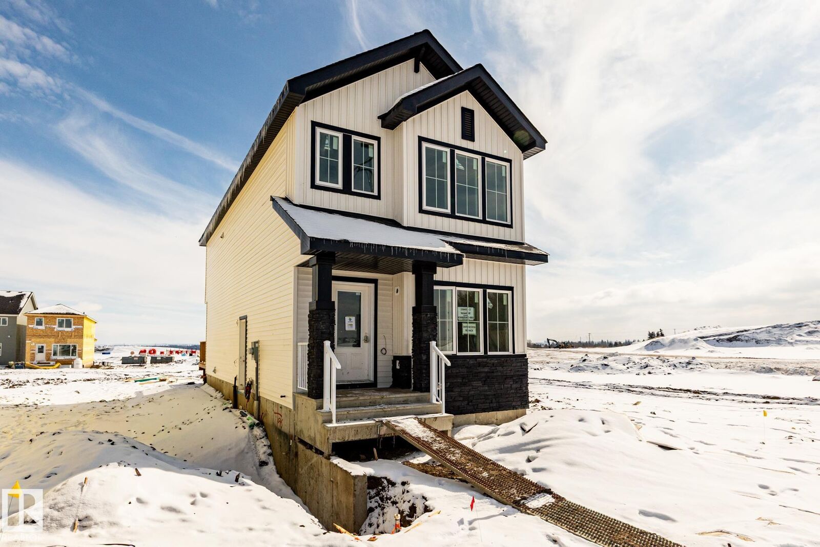 Property Photo: 15647 2 Street NE AB T5Y 6K8