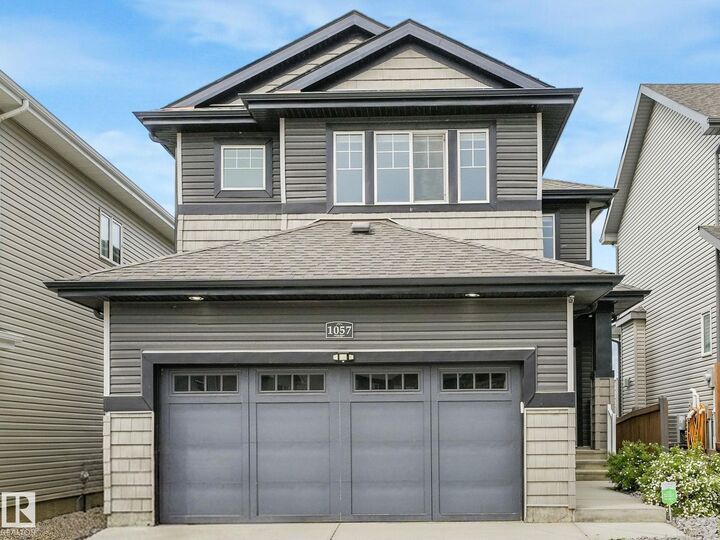 1057 Coopers Hawk Link NW — photo 1