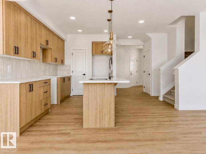 Property Photo: 2211 Crossbill Link NW AB T5S 0W3