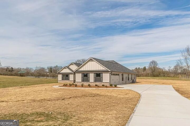 Property Photo:  1416 Morgan Road  GA 30110 