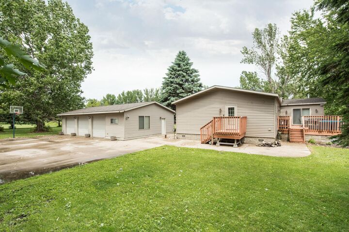 Property Photo: 1009 County Road 10 NE MN 56360