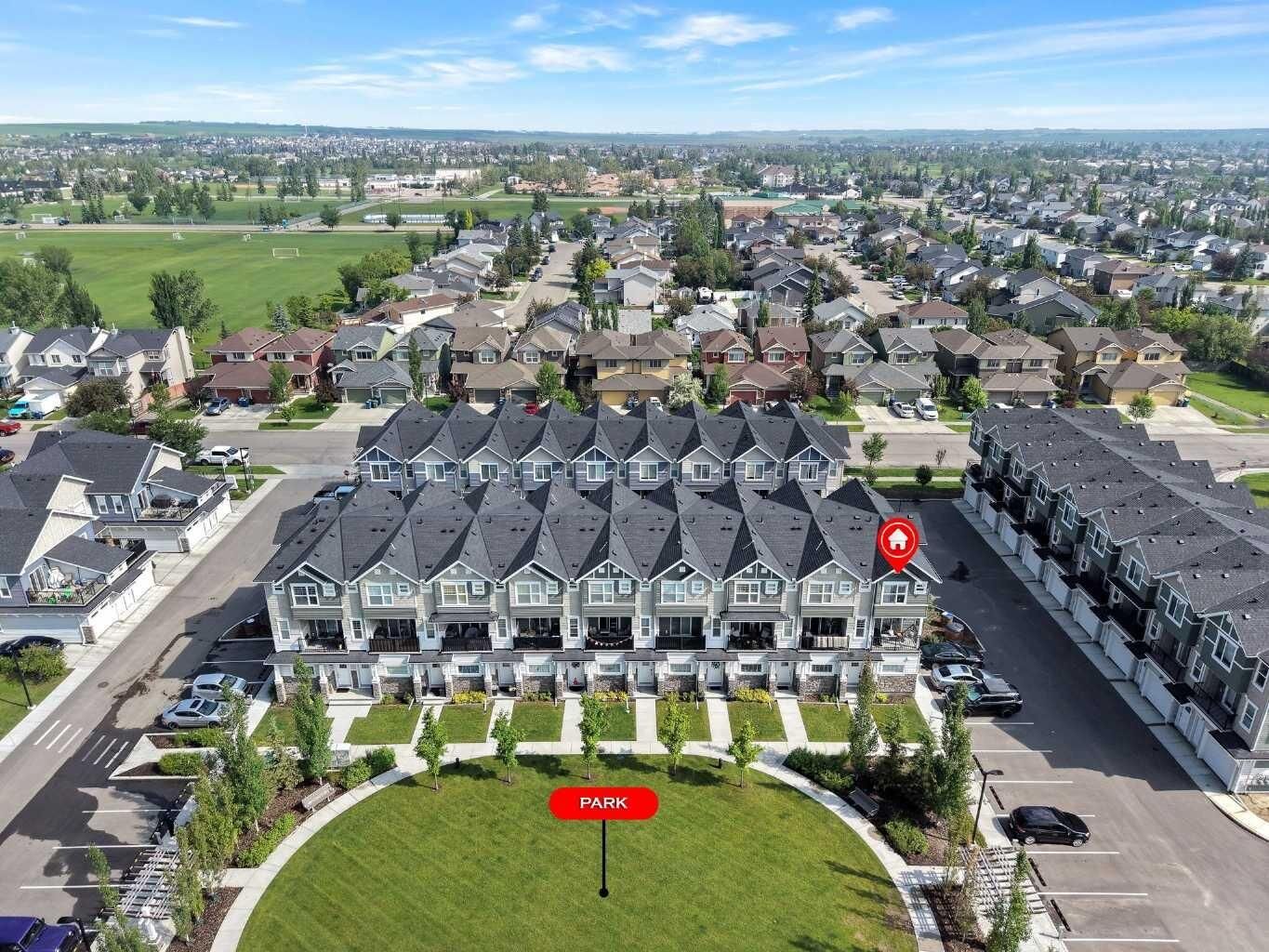 Property Photo: 115 Sagewood Drive SW 809 AB T4B 4V5