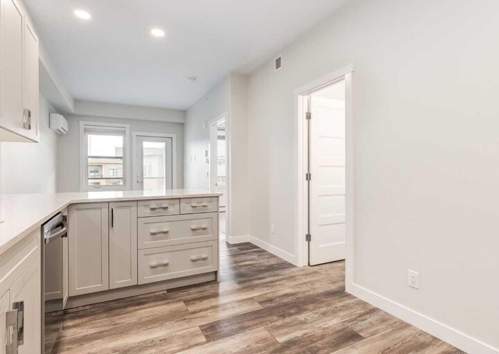 Property Photo: 125 Wolf Hollow Crescent SE 408 AB T2X 5W9