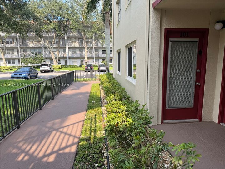 Property Photo:  100 SW 132nd Way 101K  FL 33027 