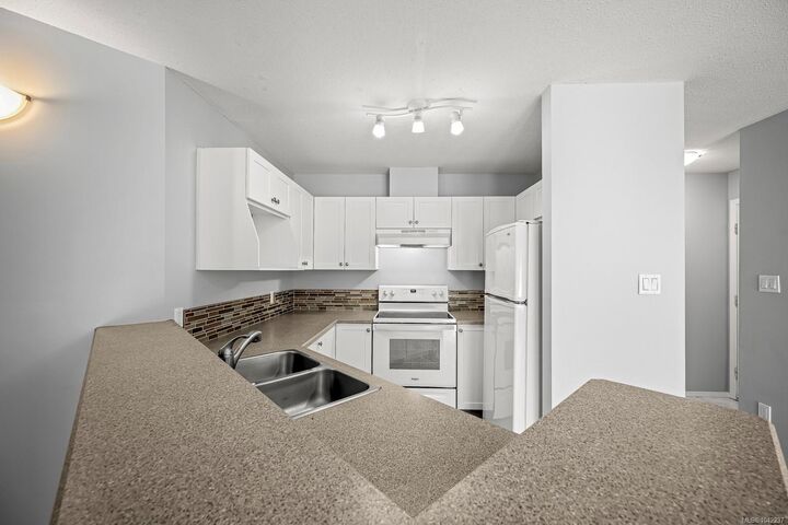 Property Photo: 4700 Alderwood Pl #103 BC V9N 9A1