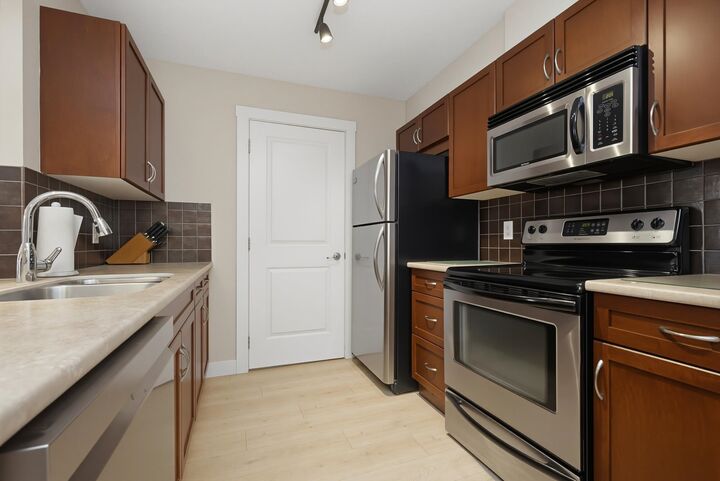 Property Photo: 2038 Sandalwood Crescent 306 BC V2S 3H6