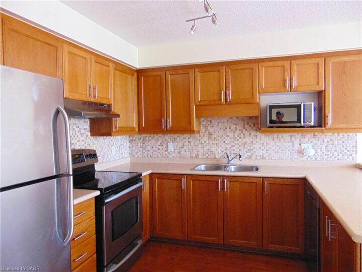 Property Photo:  214 Snowdrop Crescent  ON N2E 4C2 