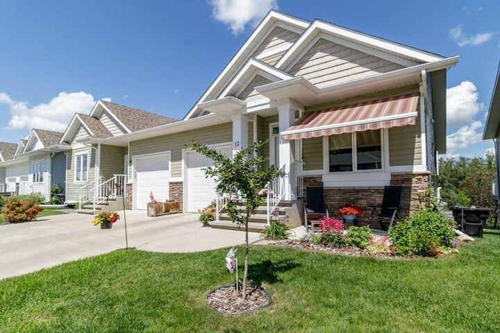 Property Photo: 12 Beardsley Crescent AB T4L 0G4