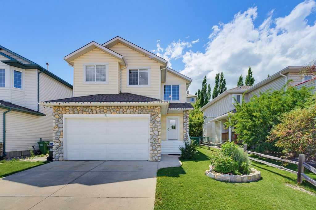 Property Photo: 11 Bow Ridge Link AB T4C 1V7