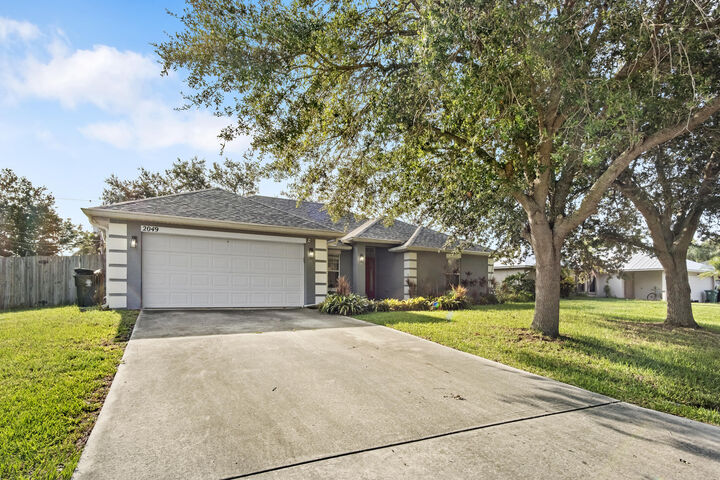 Property Photo: 2049 SW Capeador Street FL 34953