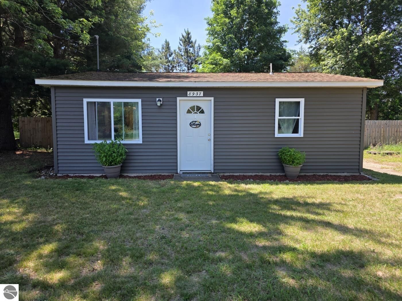 Property Photo:  8937 Valley Road, NW  MI 49646 