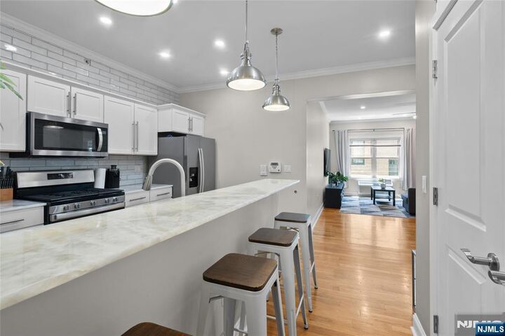 Property Photo:  5501 Hudson Avenue 407  NJ 07093 