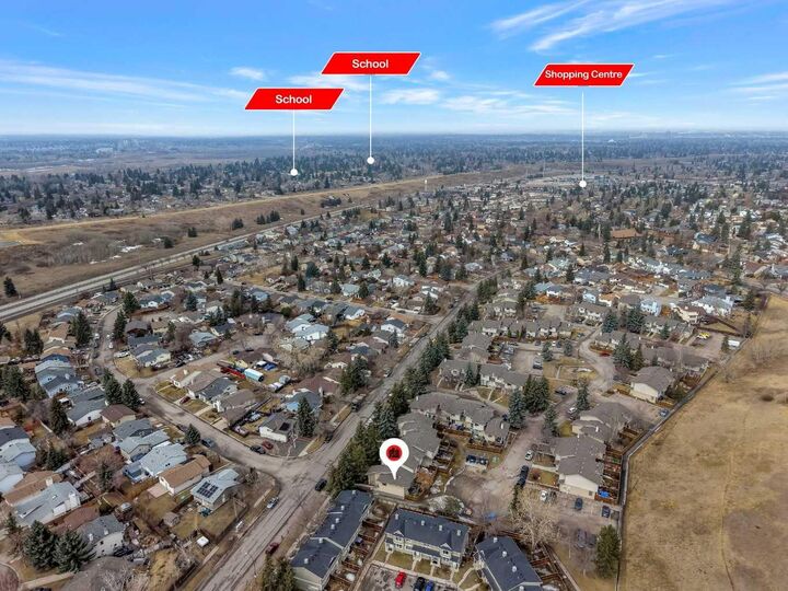 Property Photo: 115 Deerfield Drive SE AB T2J 6T9