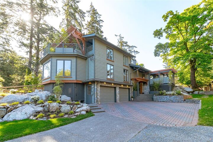 Property Photo: 4906 Cordova Bay Rd BC V8Y 2J5