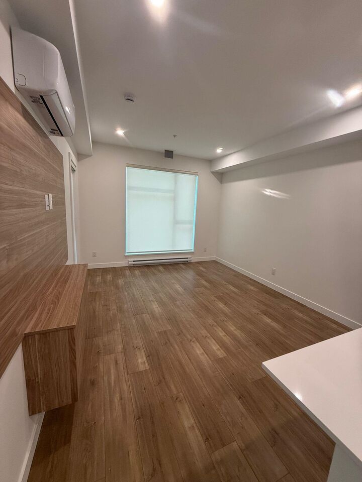 Property Photo: 14398 60 Ave Street 213 BC V3X 2N5