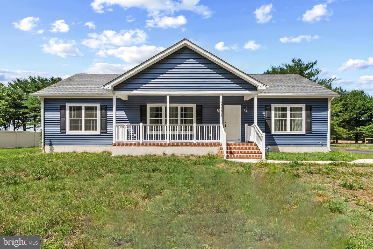 Property Photo: 22271 Cubbage Pond Road DE 19960