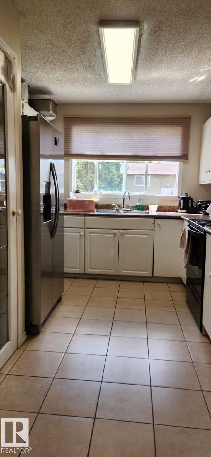 Property Photo: 14411 31 Street NW AB T5Y 1Z1