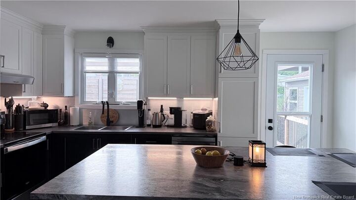 Property Photo: 52 Emile Simard Avenue Ave NB E3V 3P7