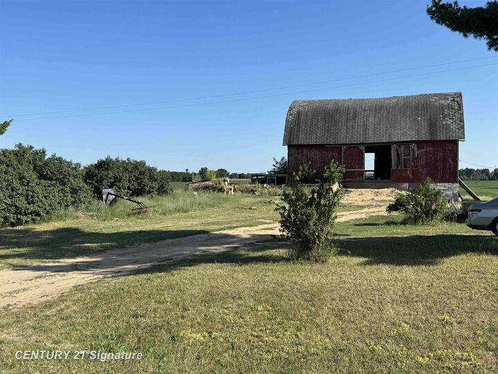 Property Photo:  5732 E Grass Lake Road  MI 48617 