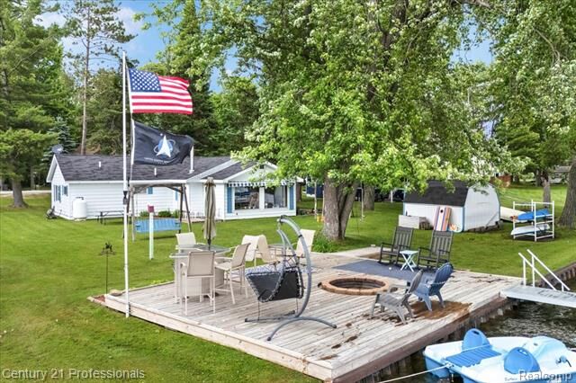 Property Photo:  5980 Birchwood Drive  MI 48739 