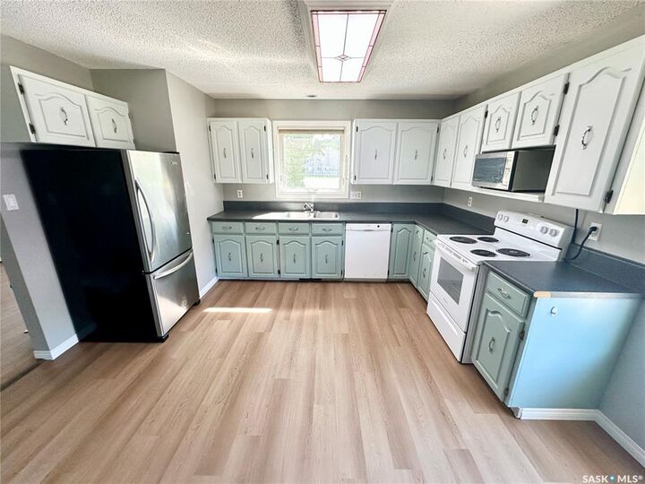 Property Photo: 213 18th Street NE SK S4H 3J4