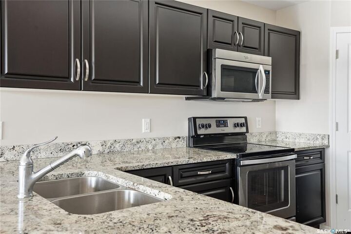 Property Photo:  100 Chaparral Boulevard 331  SK S0K 0A2 