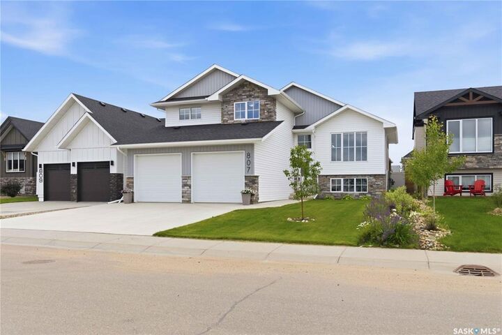 Property Photo: 807 Weir Crescent SK S0K 4S4
