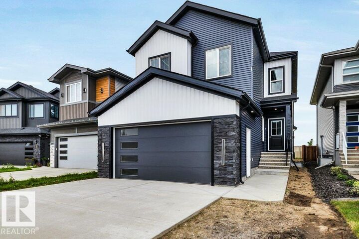 Property Photo: 5253 Kimball Crescent SW AB T6W 4Z3