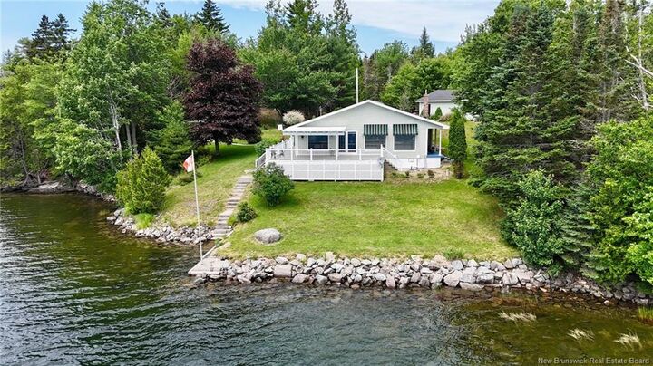 Property Photo:  106 Lakeside Dr  NB E5B 2X9 