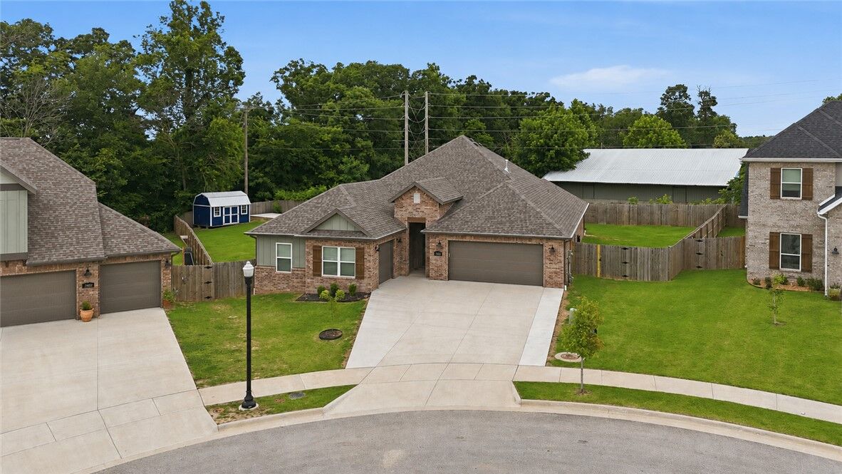 Property Photo:  3800 SW Pinecrest Drive  AR 72713 