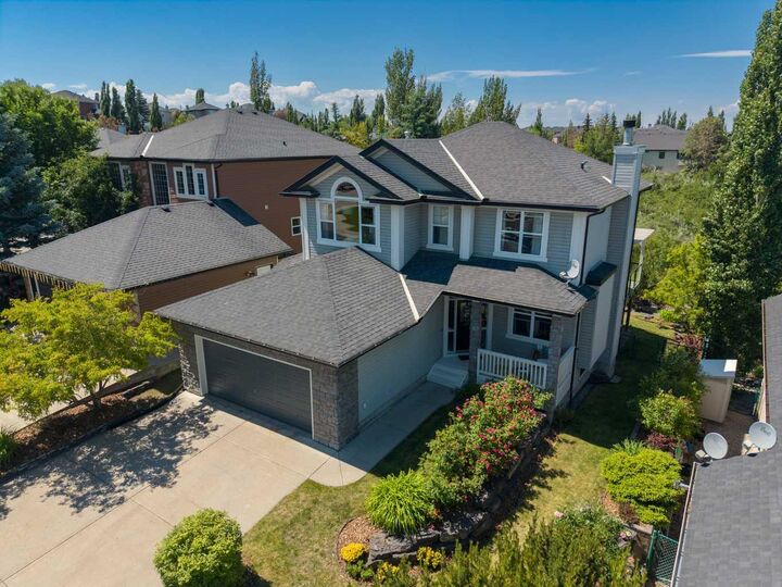Property Photo: 124 Valley Creek Crescent NW AB T3B 5V3