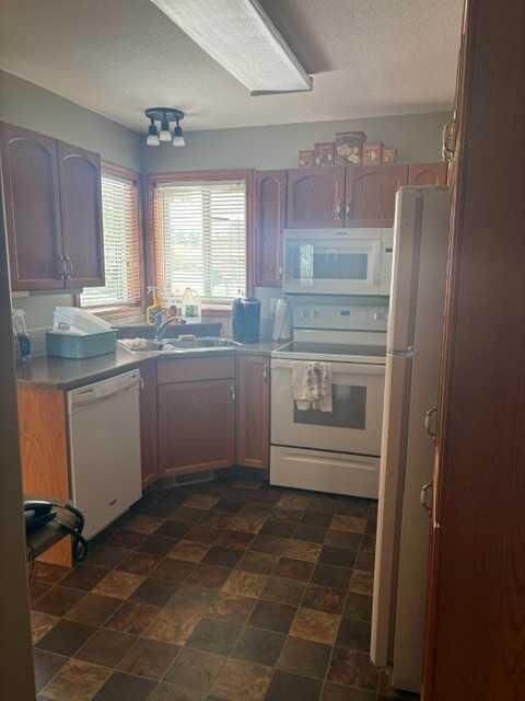 Property Photo:  4715 55 Avenue  AB T4L 1T7 