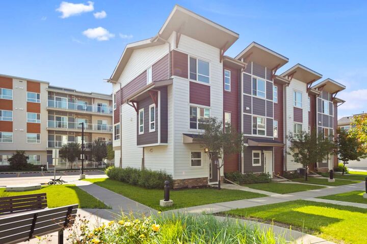 Property Photo:  209 Harvest Hills Common NE  AB T3K 2M7 