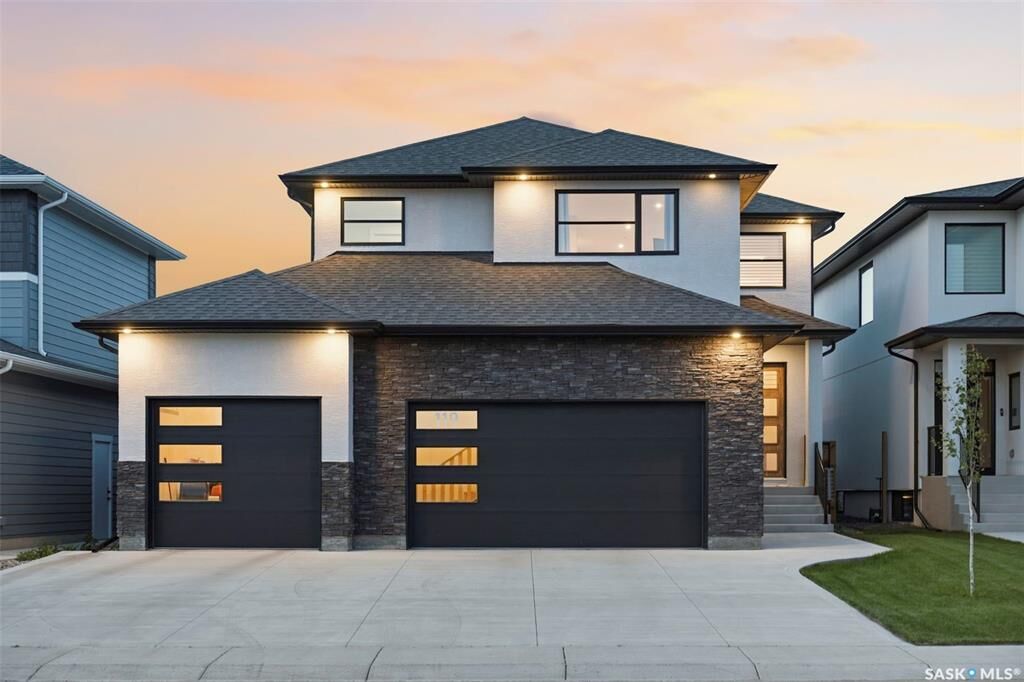 Property Photo: 119 Woolf Bend SK S7W 1E6