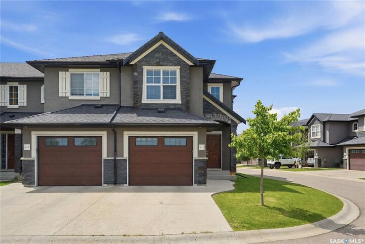 Property Photo: 1303 Paton Crescent 311 SK S7W 0P6
