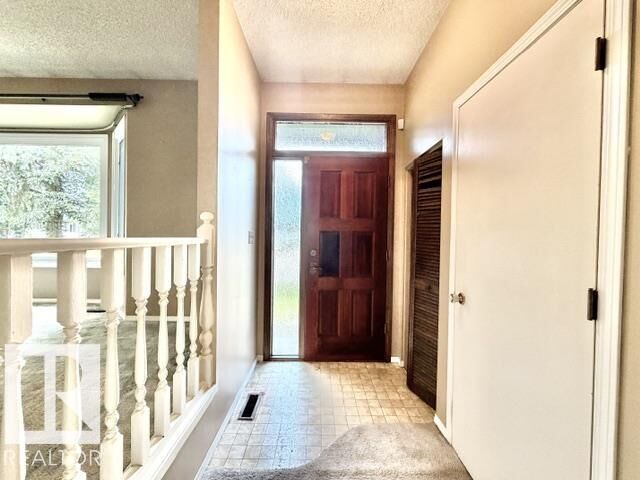 Property Photo: 111 Green Ash Drive AB T9A 2H7