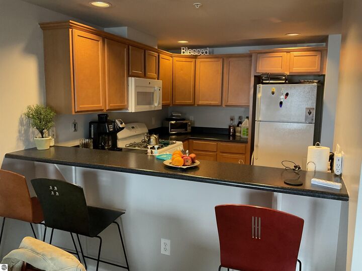 Property Photo:  301 N Lake Street 206  MI 49601 