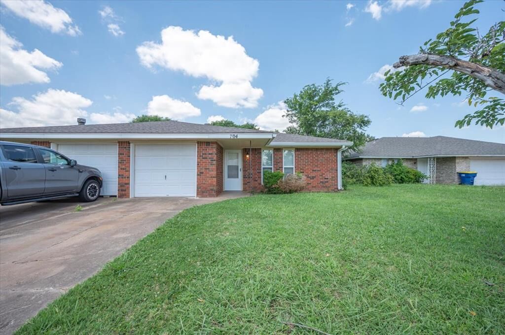 Property Photo: 702 E Redbud Court 702 &Amp 704 OK 74075