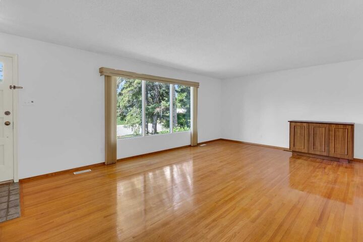 Property Photo:  11224 Wilson Road SE  AB T2J 2E2 