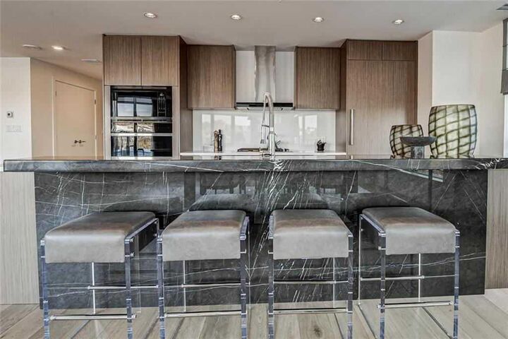 Property Photo: 128 Waterfront Court SW 501 AB T2P 1K9
