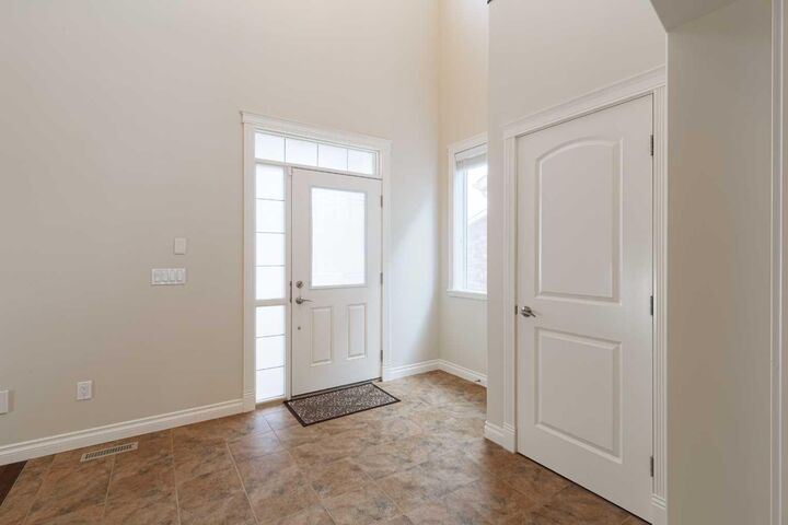 Property Photo: 97 Aspenshire Drive SW AB T3H 0P6