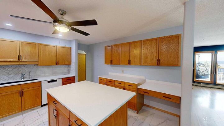 Property Photo: 75 1 Avenue S 203 AB T1J 4R2