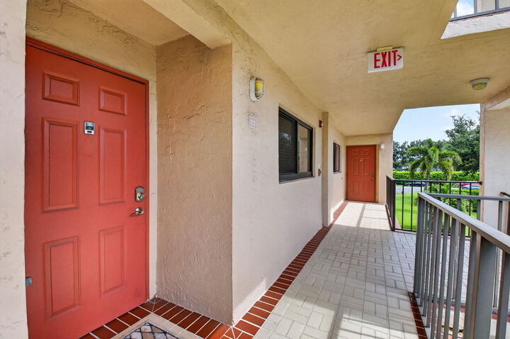 Property Photo:  15075 Witney Road 213  FL 33484 