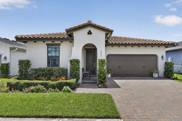 Property Photo: 1217 Wandering Willow Way FL 33470