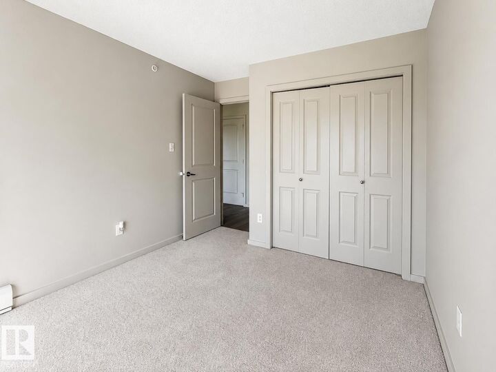 Property Photo:  142 Ebbers Boulevard NW 419  AB T5Y 3W2 
