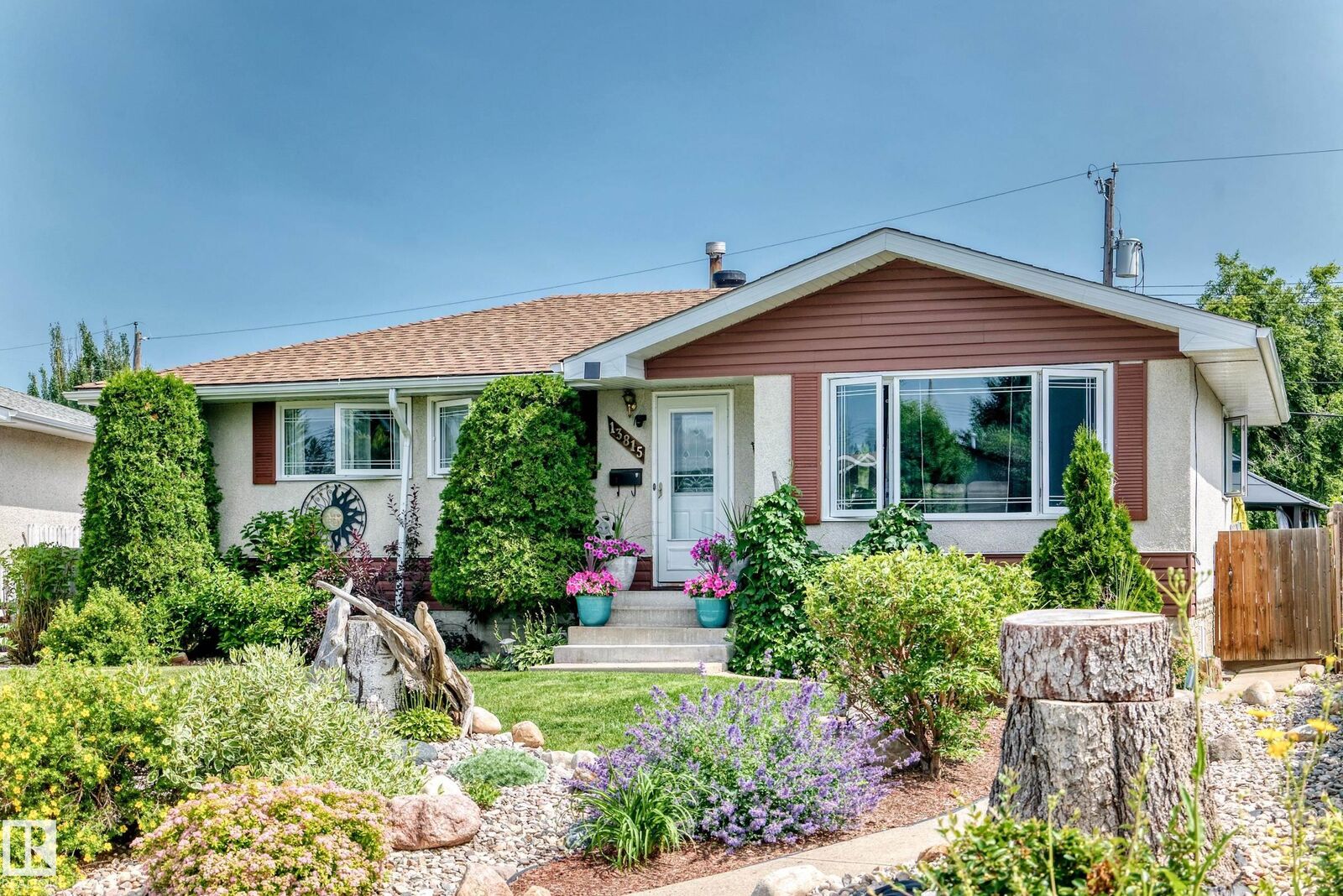 Property Photo:  13815 62 Street NW  AB T5A 1P6 